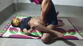 Indian Teen Bent Over Desk by Yoga Coach