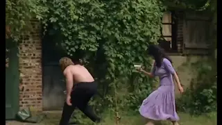 Vintage French Lovers Embrace Under Open Sky in 70s Retro Film