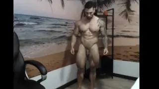 Muscular Hunk Shows Off Massive Cock on Webcam