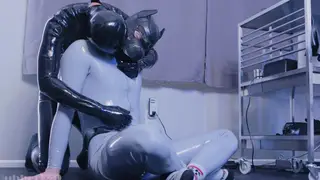 Muscular Sub in Latex Endures Toy Torment From His Dom