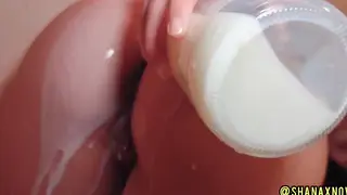 Petite Curvy MILF Enjoys Facial Under Warm Shower Spray