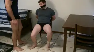 Bound Guy Endures Tickle Torment in Bondage