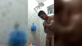 Handsome Guy Strokes His Big Cock in a Bathroom