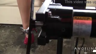 Voluptuous Brunette Rides a Thrusting Machine to Orgasm