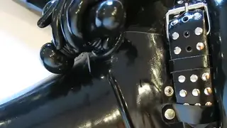 Latex-Clad Dom Teases Sub with Rubber CBT Play
