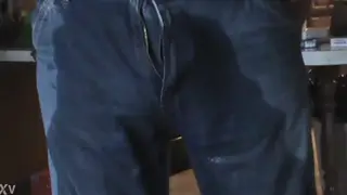 Muscular Jock Wets His Jeans While Pissing