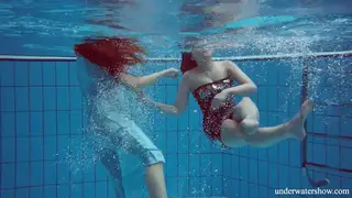 European Lesbians Lick Pussy Underwater in Pool Setting