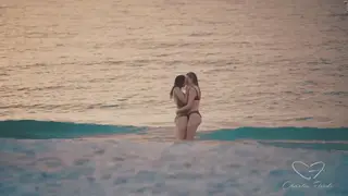 Blonde Lesbians Share Oral Pleasure on Sunny Beach