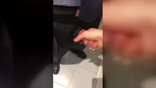 Young Employee Services Older Boss at the Desk