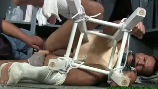 Muscular Athlete Endures Foot Spanking and Toy Play
