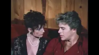 Vintage Mature Woman Seduces Man in Retro Encounter