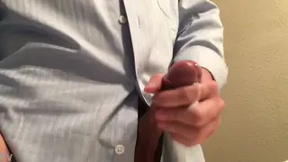 Guy in Uniform Strokes Uncut Cock to Cumshot