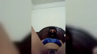 Busty Woman Caresses Her Curves in a Sensual Solo