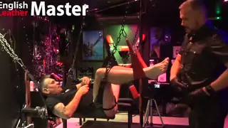 Leather-Clad Daddy Dominates Hairy Bear in Raw Encounter