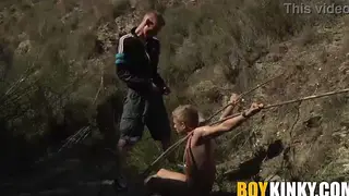 Bound Twink Takes a Rough Blowjob Outdoors