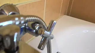 Mature Woman Soaks in Bubbles While Showing Off Red Nails