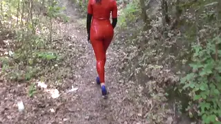 Voluptuous Redhead Bound in Latex Outdoors