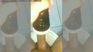 Latino Guy Strokes Hard with a Flashlight Toy