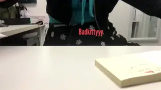 Tattooed Brunette Squirts Hard During a Live Office Call