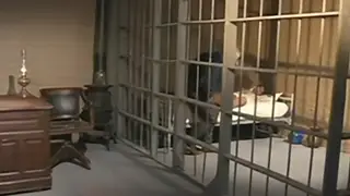 Latino Handyman Services Uniformed Officer in Jail Cell