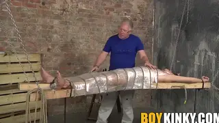 Older Dom Works a Restrained Twink to a Handjob Finish