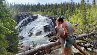 Petite Blonde Rides Her Lover Beside a Rushing Waterfall