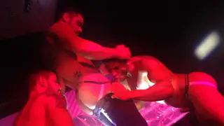 Muscular Trio Performs Live for a Club Crowd