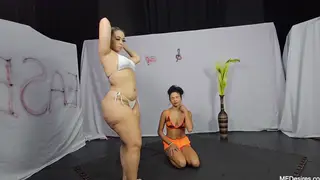 Tattooed Latina Dominates a Voluptuous Submissive in Lesbian Play