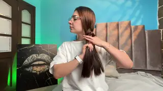 Teen Brunette Shows Off Braids and Wiggles Toes