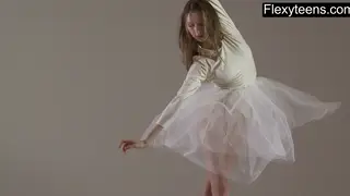 Blonde Gymnast Stretches Nude in Solo Session