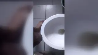 Solo Guy Lets Loose a Golden Stream on Camera in Close-Up