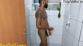 Bearded Black Stud Strokes Long Uncut Cock in Bathroom