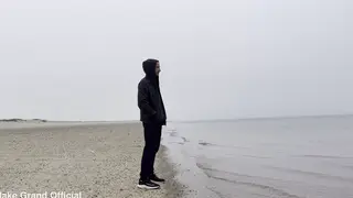 Woman Pisses in the Ocean at a Sunny Beach