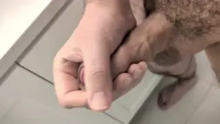 Uncut Guy Strokes His Thick Cock in the Bathroom
