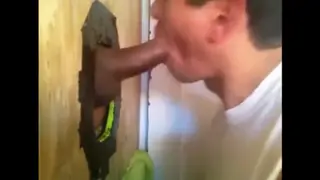 Stranger Feeds Cock Through Gloryhole for Blowjob and Facial