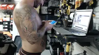 Muscular Handyman Works His Uniform in a Garage