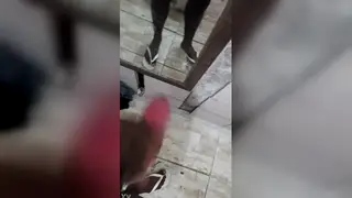 Interracial Handjob in a Tiled Bathroom Ends in Release