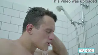 Muscular Teen Strokes His Cock in a Steamy Shower