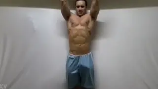 Muscular Coach Shows Off Ripped Physique During Gym Workout