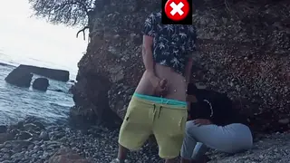 European Teen Swallows Two Mouthfuls on the Beach