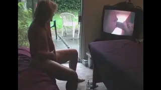 Mature MILF Watches Adult Content While Pleasuring Herself