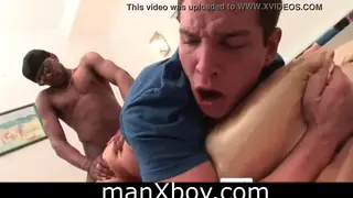 Brunette Twinks Trade Facial Finishes on Messy Bed