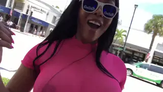 Ebony Babe Flaunts Oiled Curves in Public