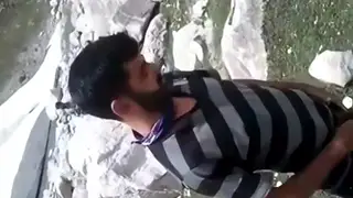 Indian Man Lets a Warm Stream Flow Over His Skin