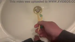 Solo Guy Relieves Himself Into a Sink Basin