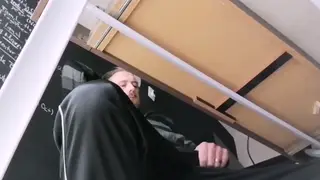 Asian Teacher Strokes His Hard Cock at His Desk