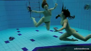 Brunette European Teens Share Lesbian Pool Play
