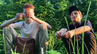 Two Men Share Oral Pleasure In Secluded Forest Clearing