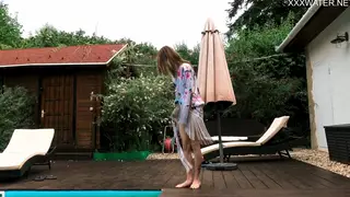 Petite European Brunette Teases Underwater in Public