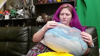 Voluptuous Woman Flaunts Massive Expanded Breasts